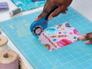 Picture of OLFA Splash Gridded Cutting Mat 12"X18" Aqua